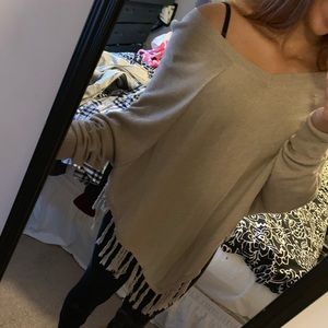 Tan poncho like sweater with fringe